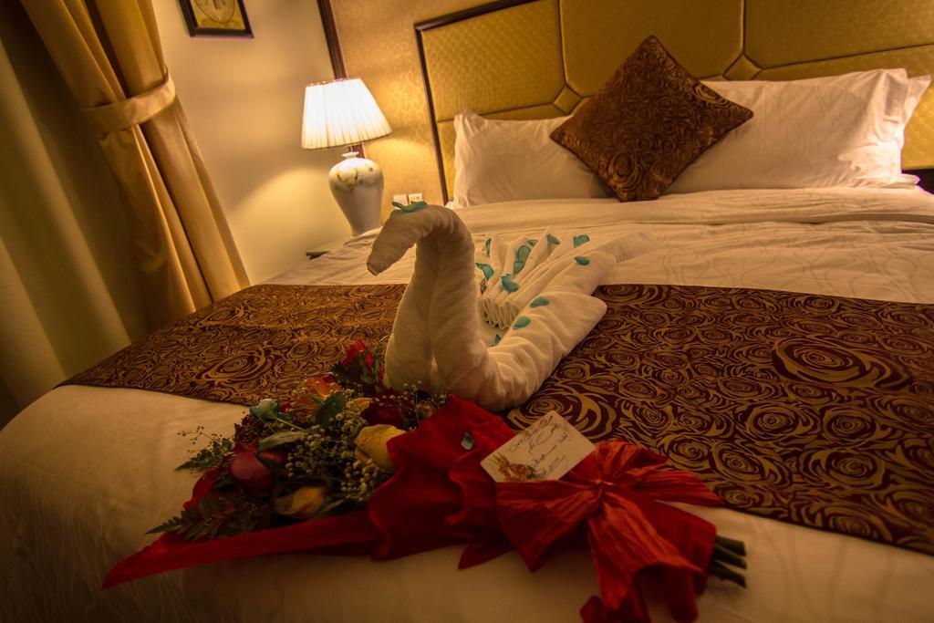 Rest Night Serviced Apartments- Alhamra Эр-Рияд Номер фото A towel swan