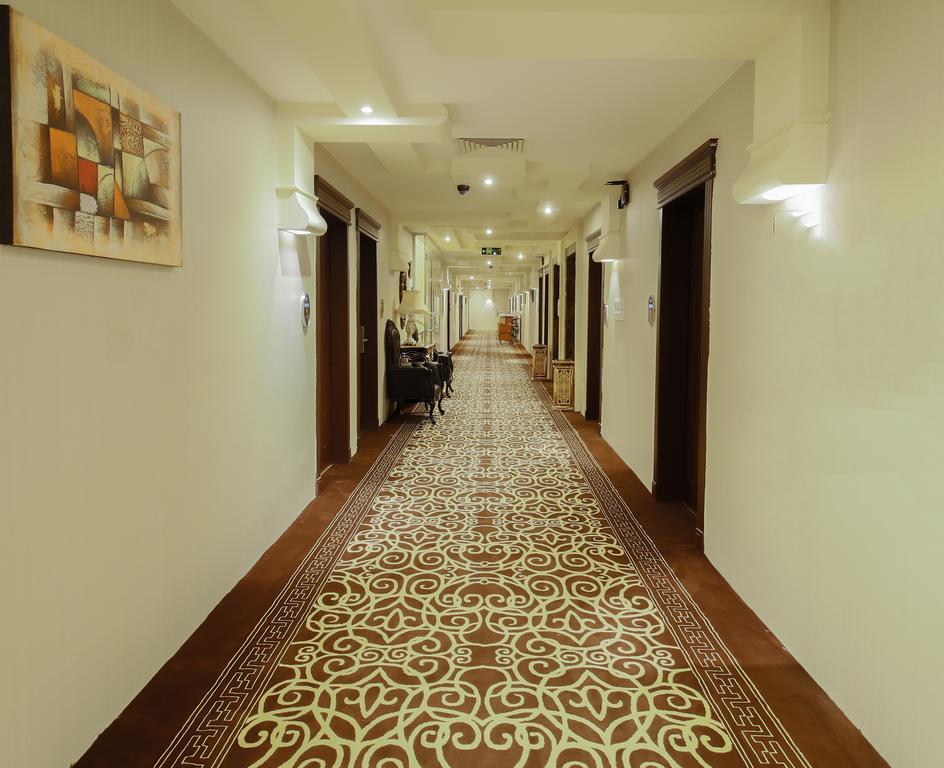 Rest Night Serviced Apartments- Alhamra Эр-Рияд Экстерьер фото A corridor at the hotel